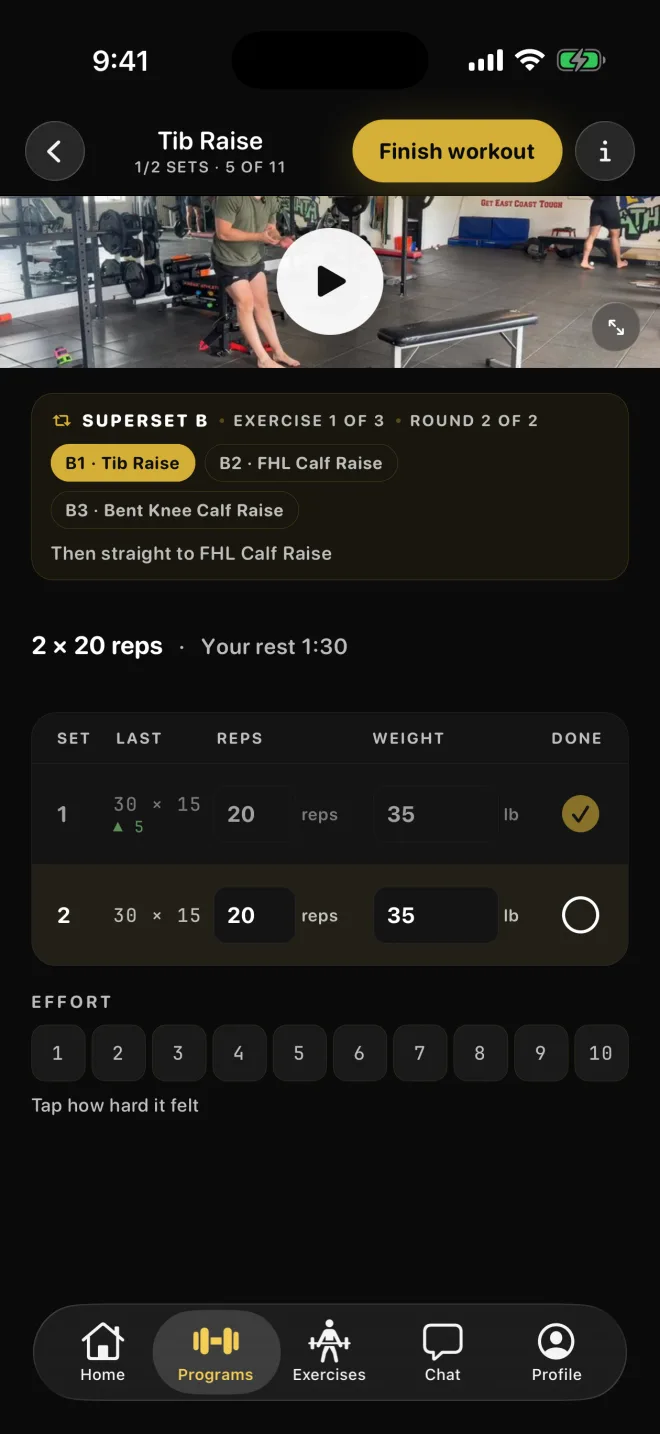 Logging a set: the exercise video, last time's numbers and a heavier weight checked off